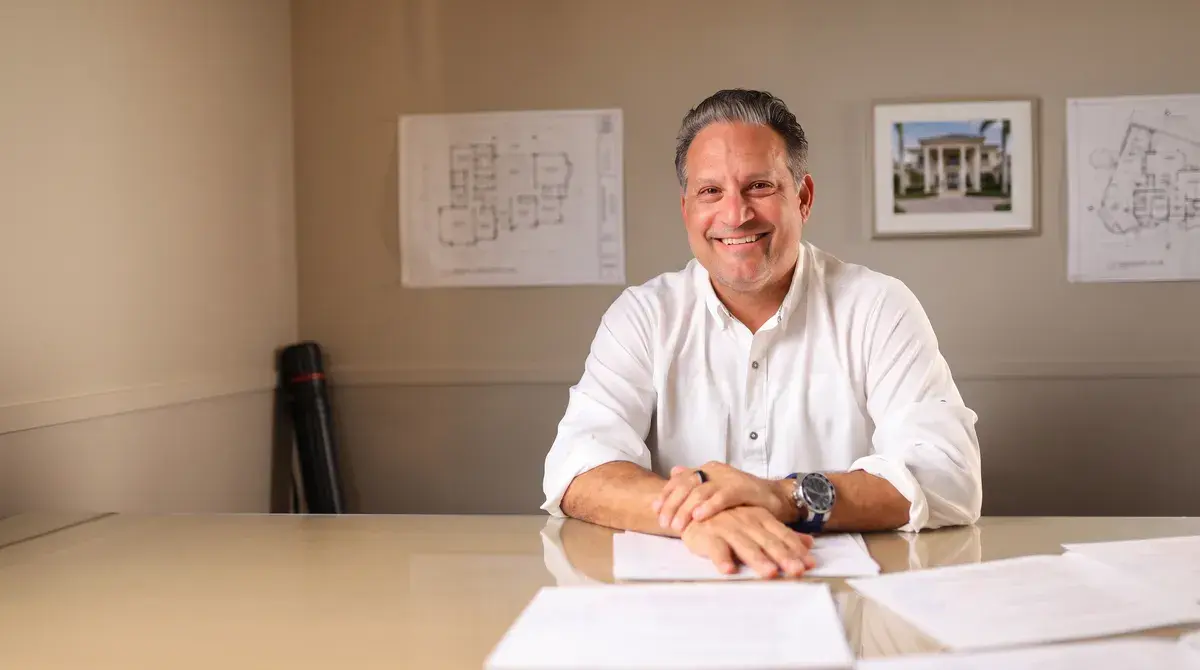 Stephen Cury, second-generation Palm Beach builder, at his desk